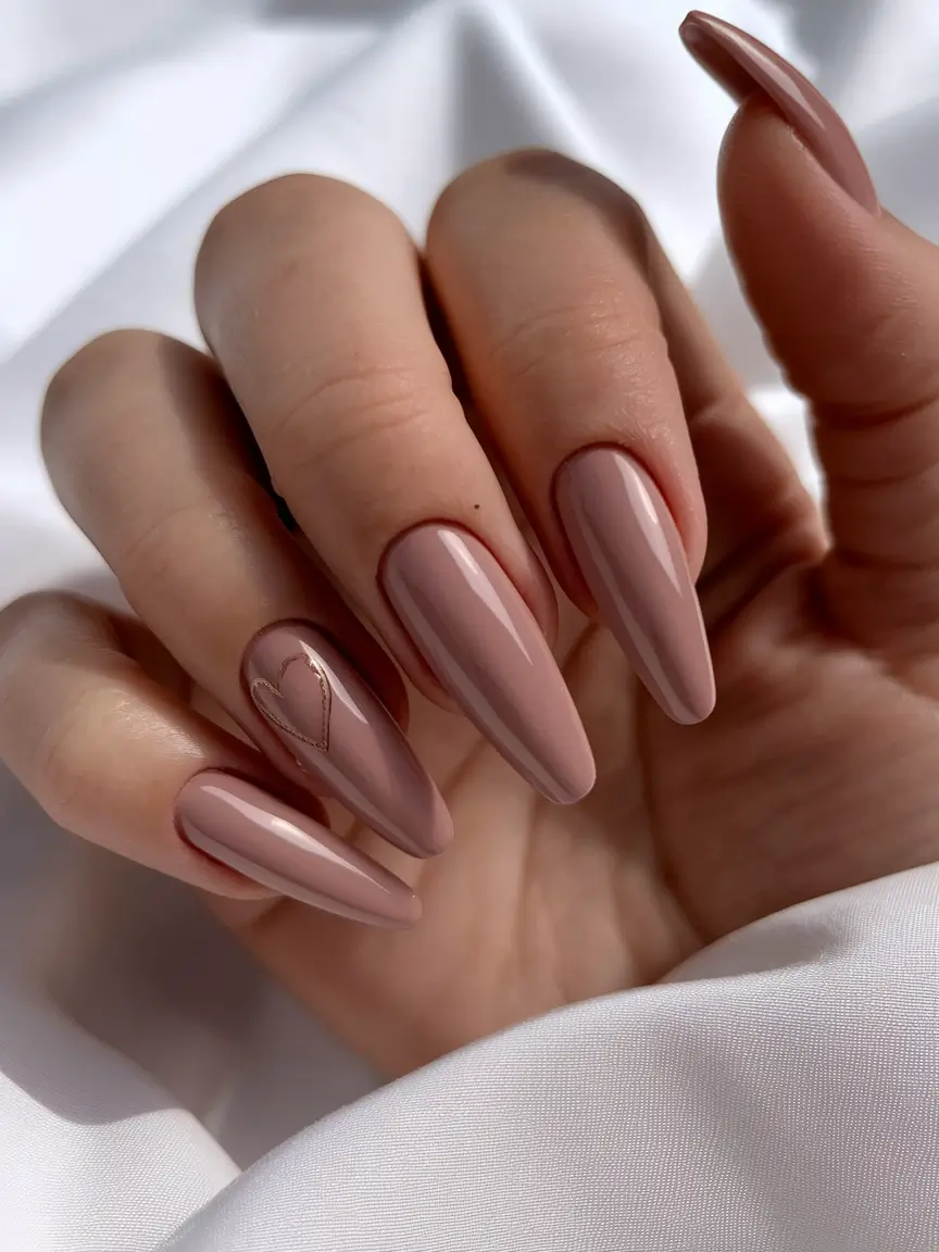 subtle fall nails 2025 Coffee-Toned Long Almond with Gold Heart Detail
