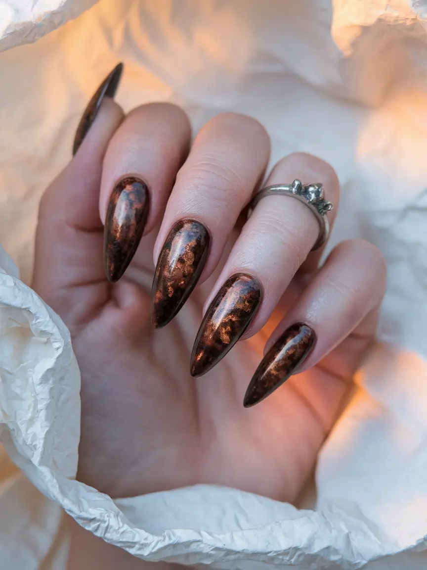brown fall nails 2025 Molten Marble Effect
