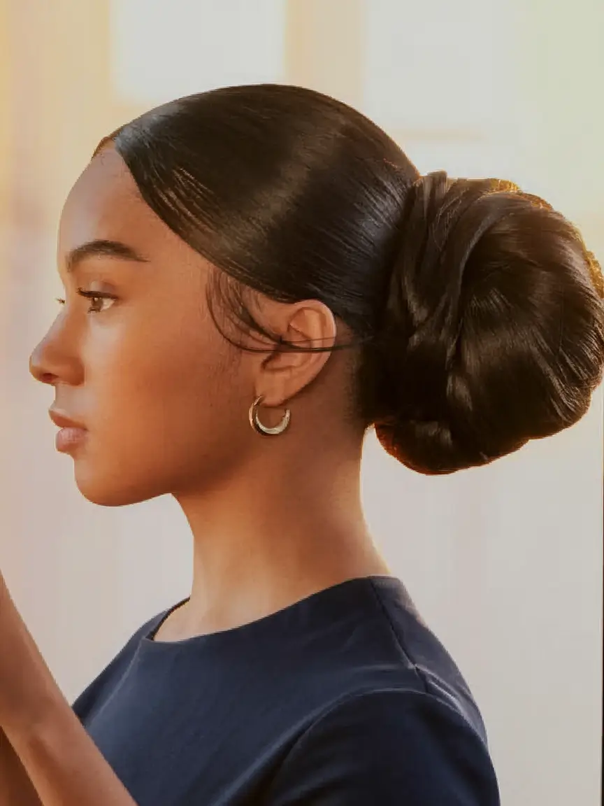easy fall hairstyles 2025 The Sleek Low Bun with High Impact