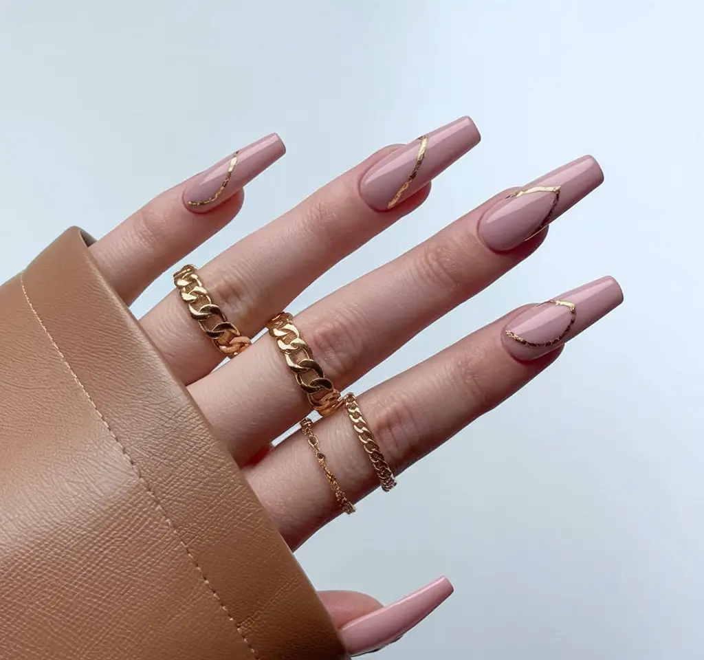 fall ballerina nails 2025 Golden Accents on Nude Perfection
