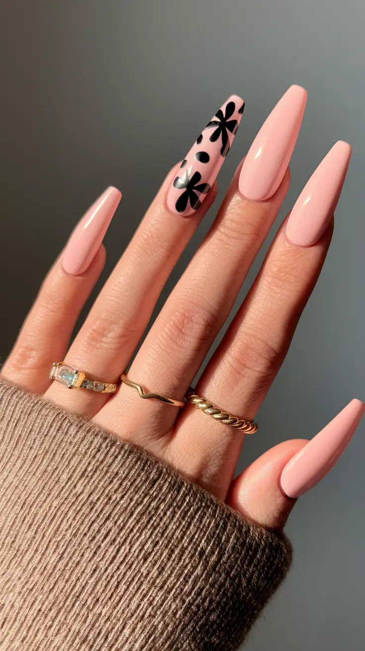 fall coffin nail ideas 2025 Playful Pink with Black Flowers