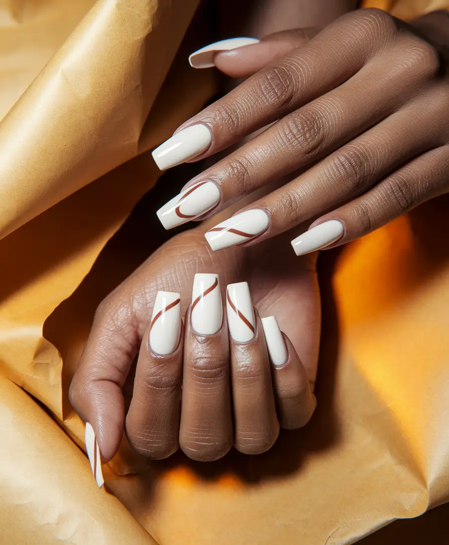 fall coffin nail ideas 2025 Minimal White with Rust Stripes