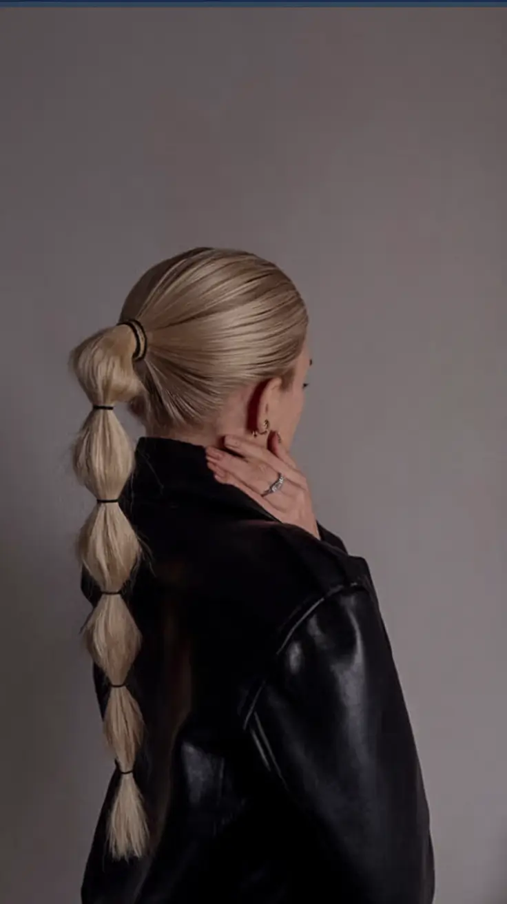 winter formal hairstyles easy Bubble Ponytail with Sleek Finish