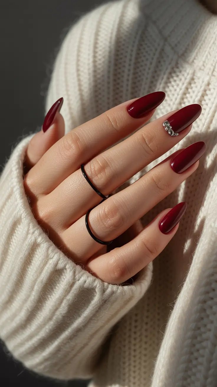 simple winter nails 2025 Classic Deep Red with Minimal Gem Accent