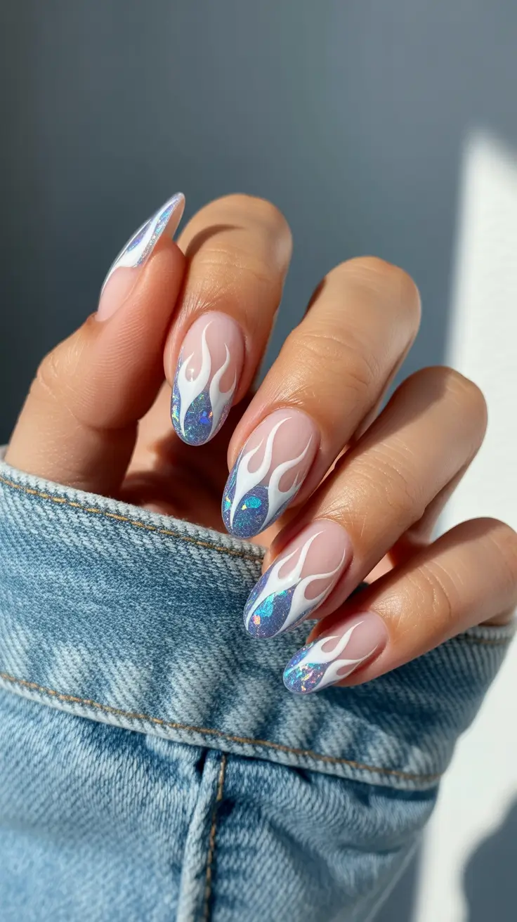 almond nail designs 2026 Opal Fire Flames With White Outlines