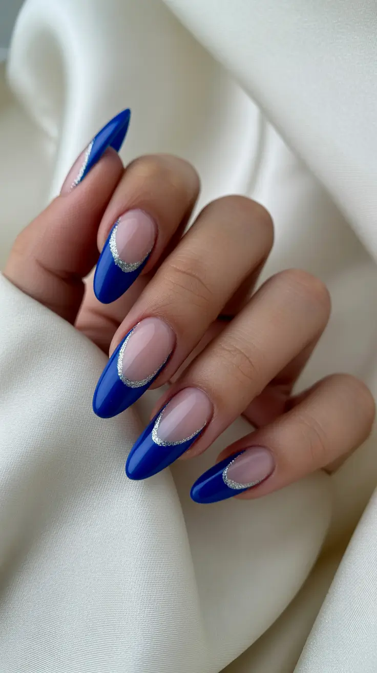 almond nail designs 2026 Royal Blue French Tips With Silver Accents