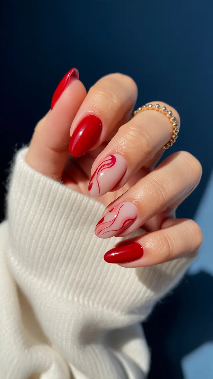 red nail designs 2026 Swirled Red Waves on Almond Nails