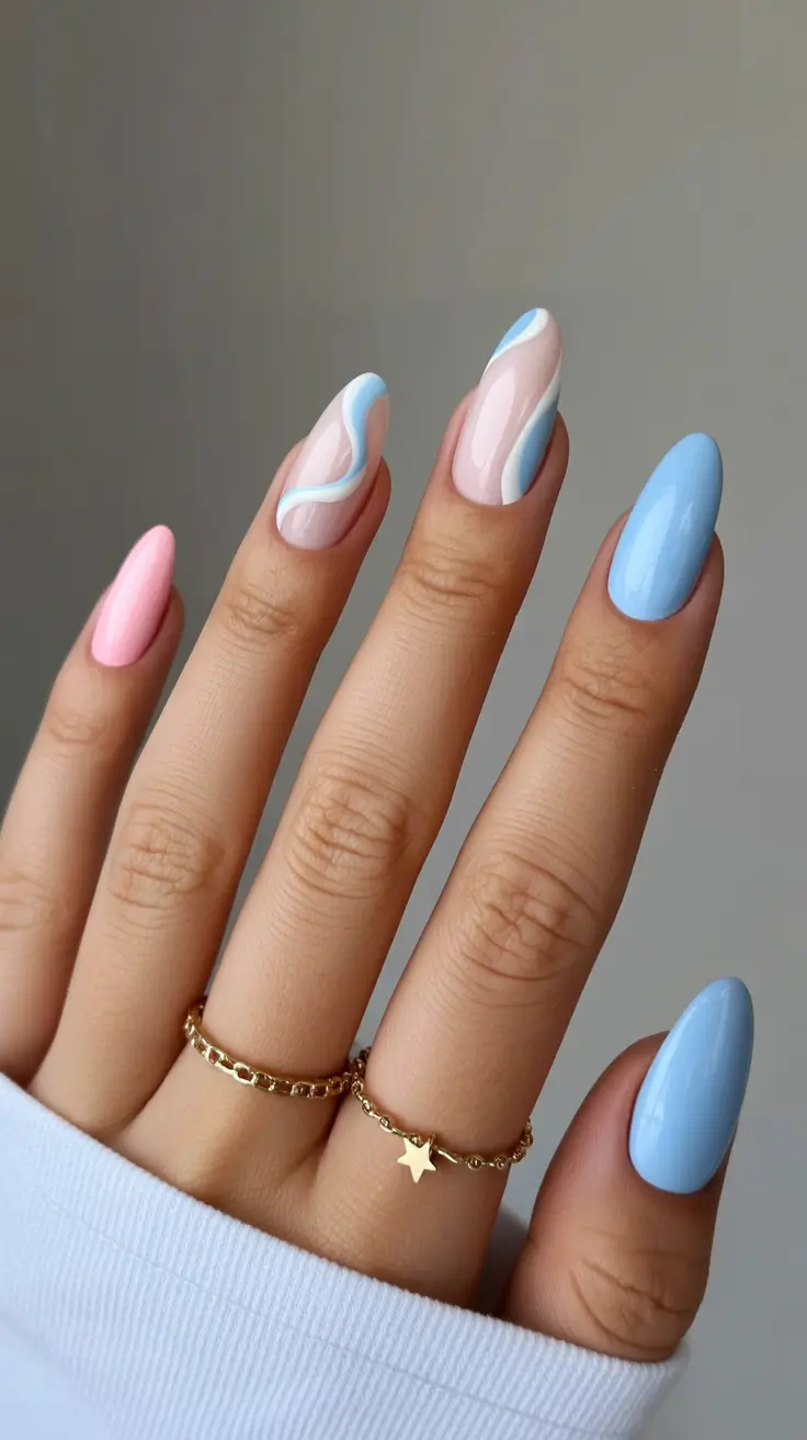 cozy trendy spring nails 2026 Soft Blue Accent Mix on Almond