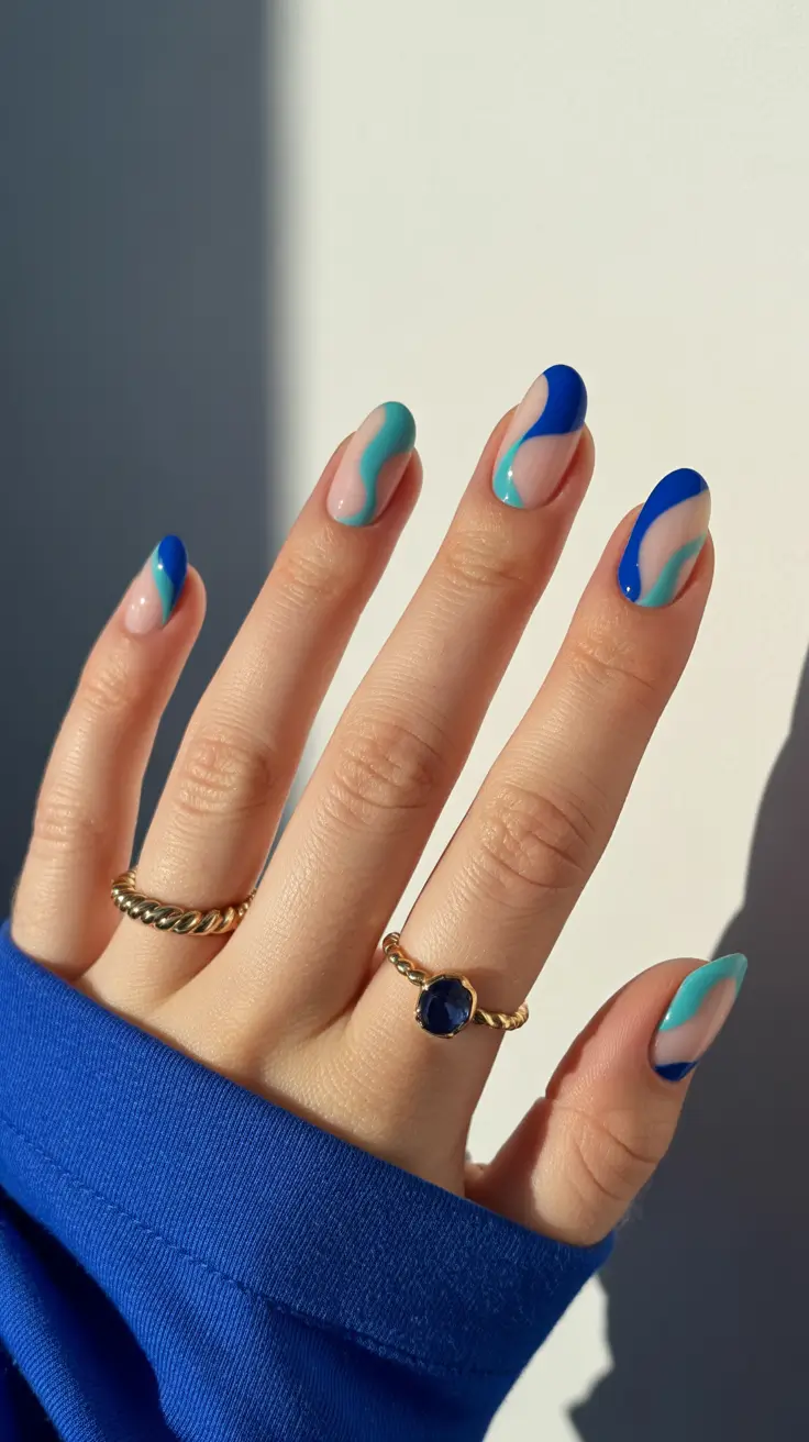 graduation nails ideas 2026 Wavy Blue and Teal Tips for a Fresh 2026 Statement