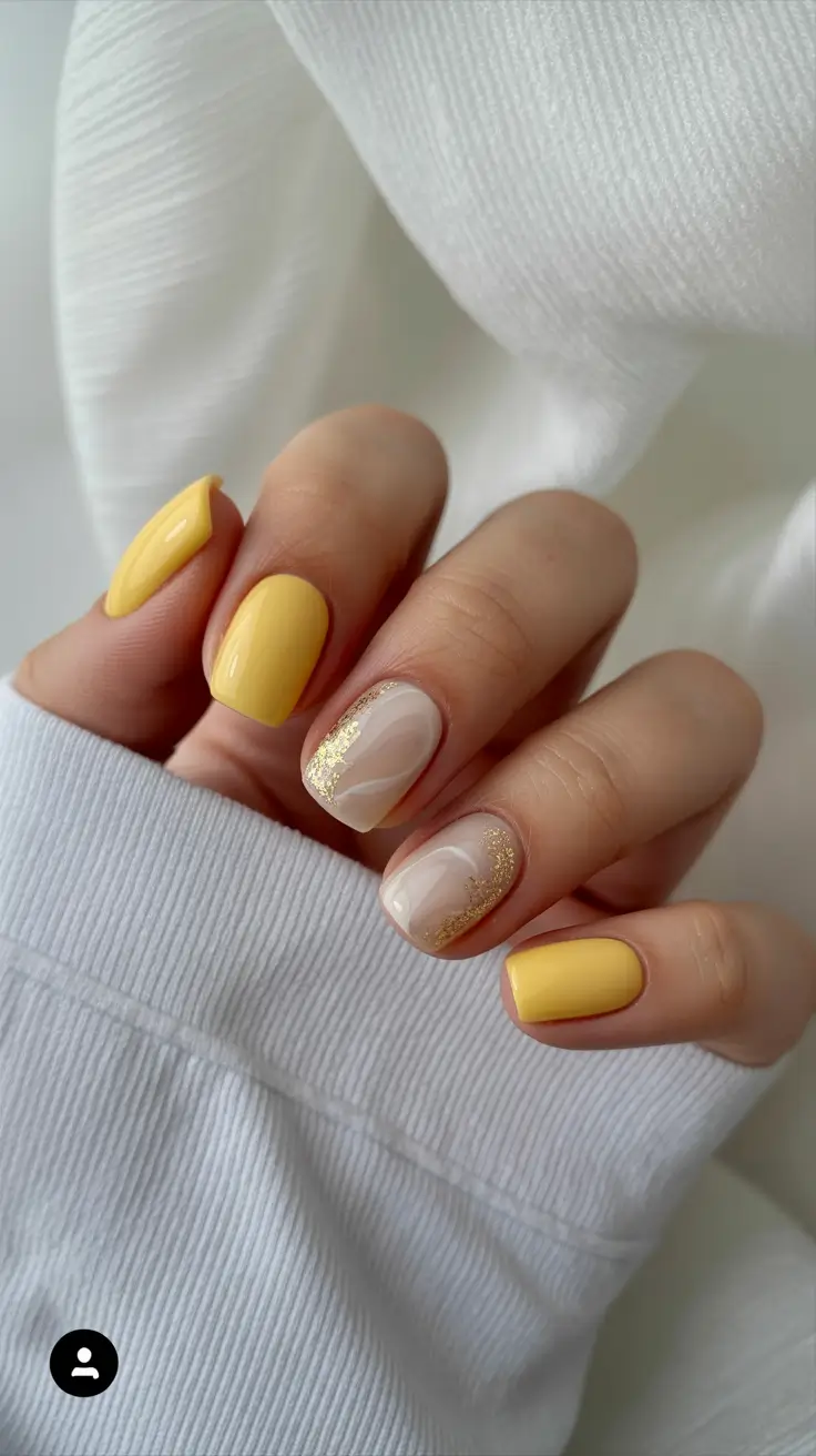 sophisticated spring gel nails polish 2026 Butter Yellow Short Gel with Gold Leaf Accent